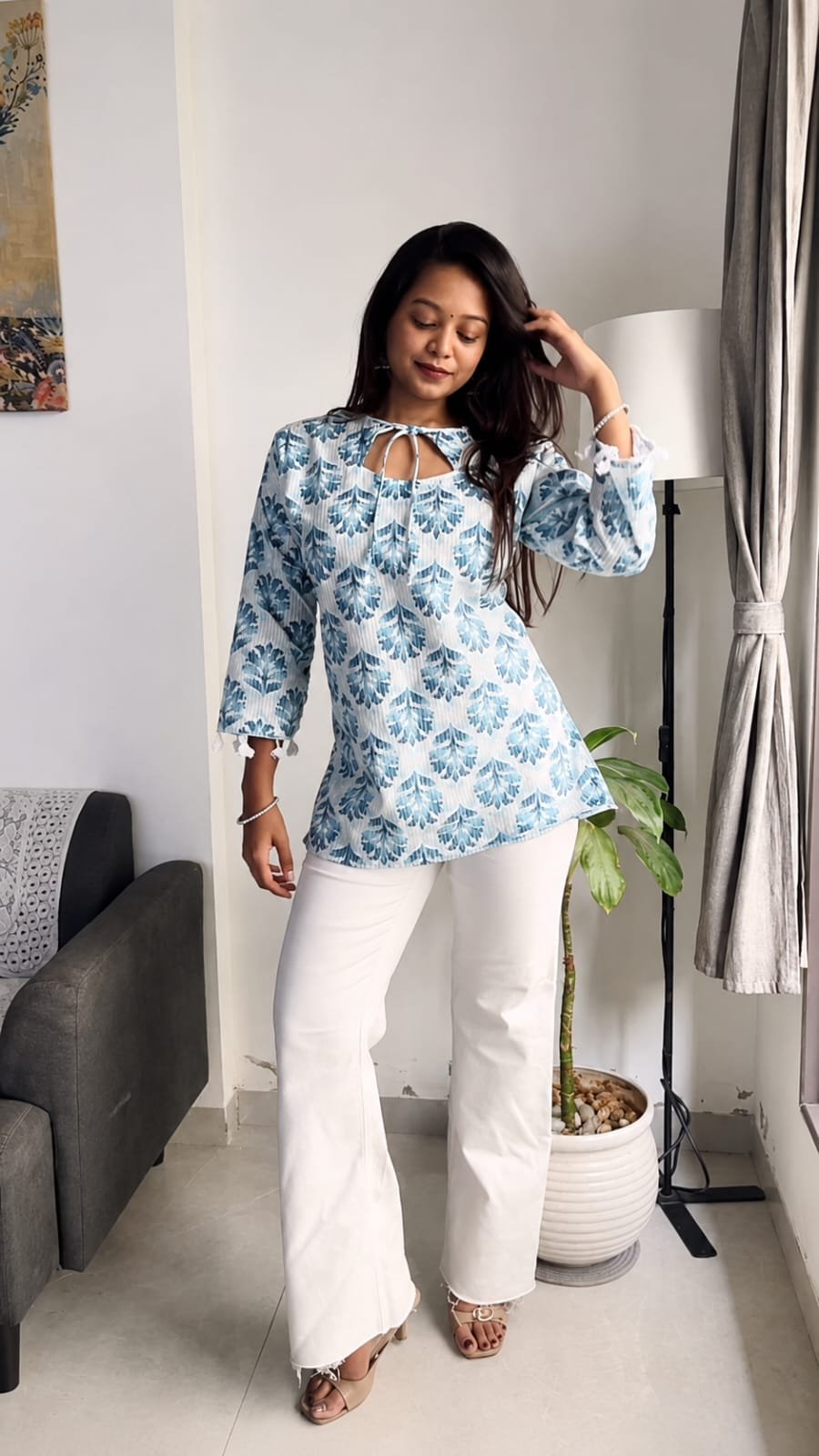 Sky Blue Floral Printed Tie-Up Neck Short Kurti with White Pants